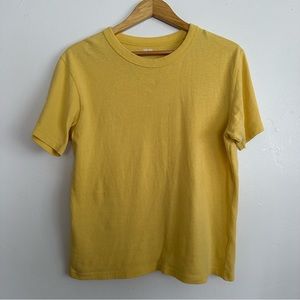 Yellow UNIQLO t-shirt